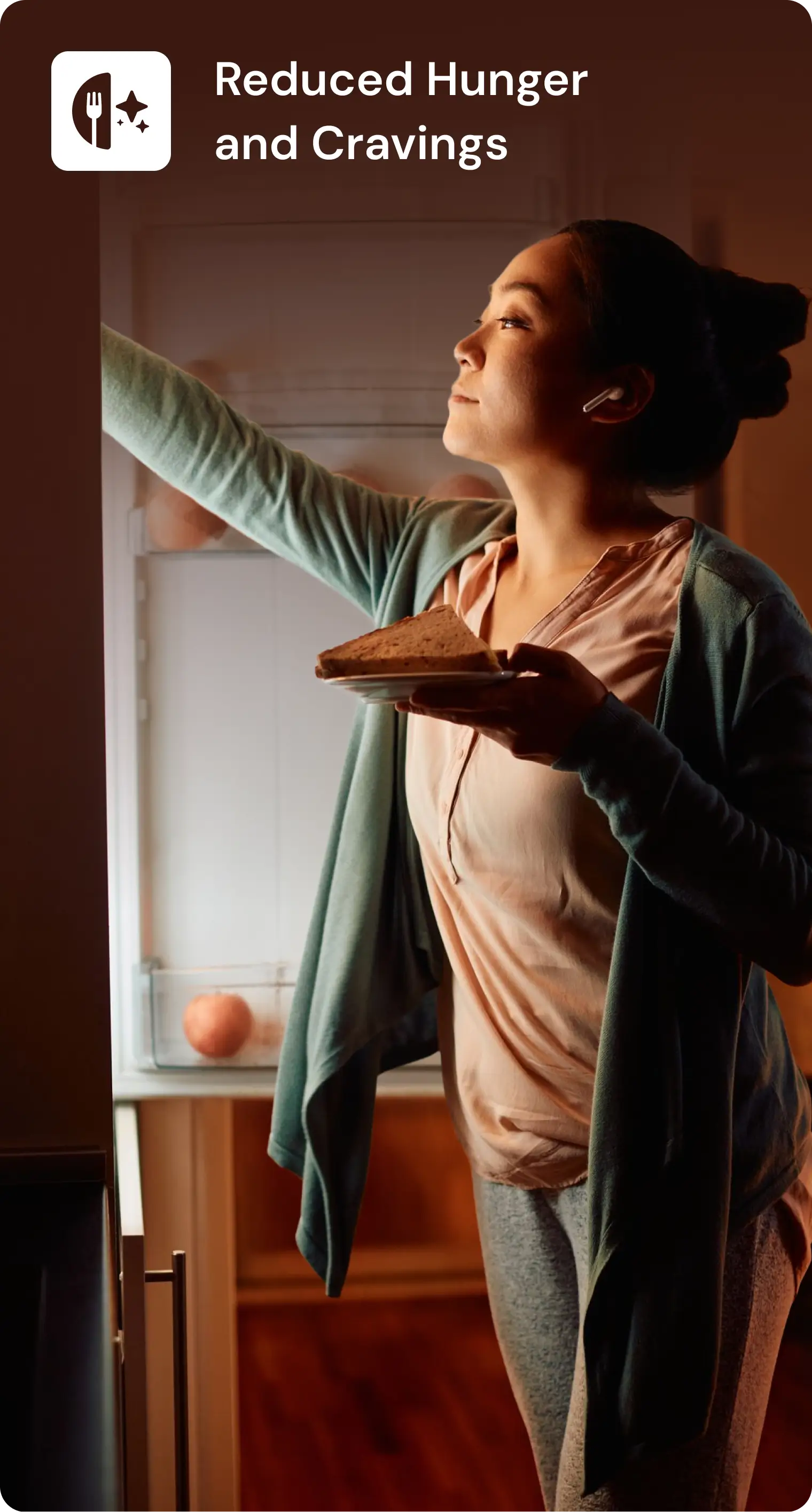 Reduced hunger and cravings: person at an open refrigerator with a small plate of food